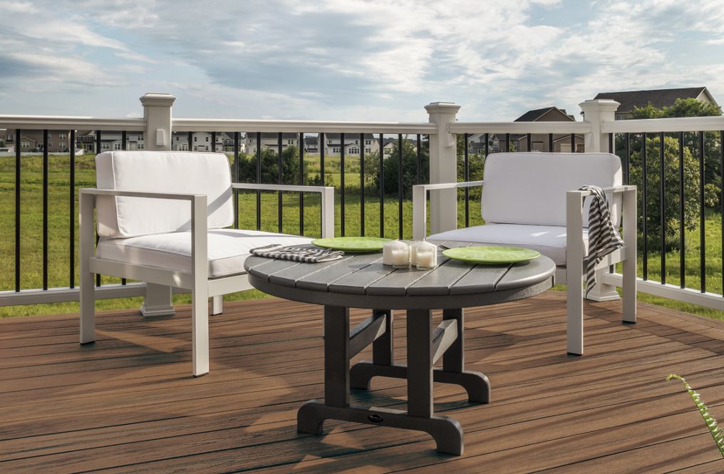 Low-maintenance composite deck designed and installed by Proud Custom Decks